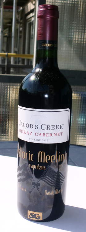 Historic Castro ' Obama meeting engraved on jacob's creek Cabernet